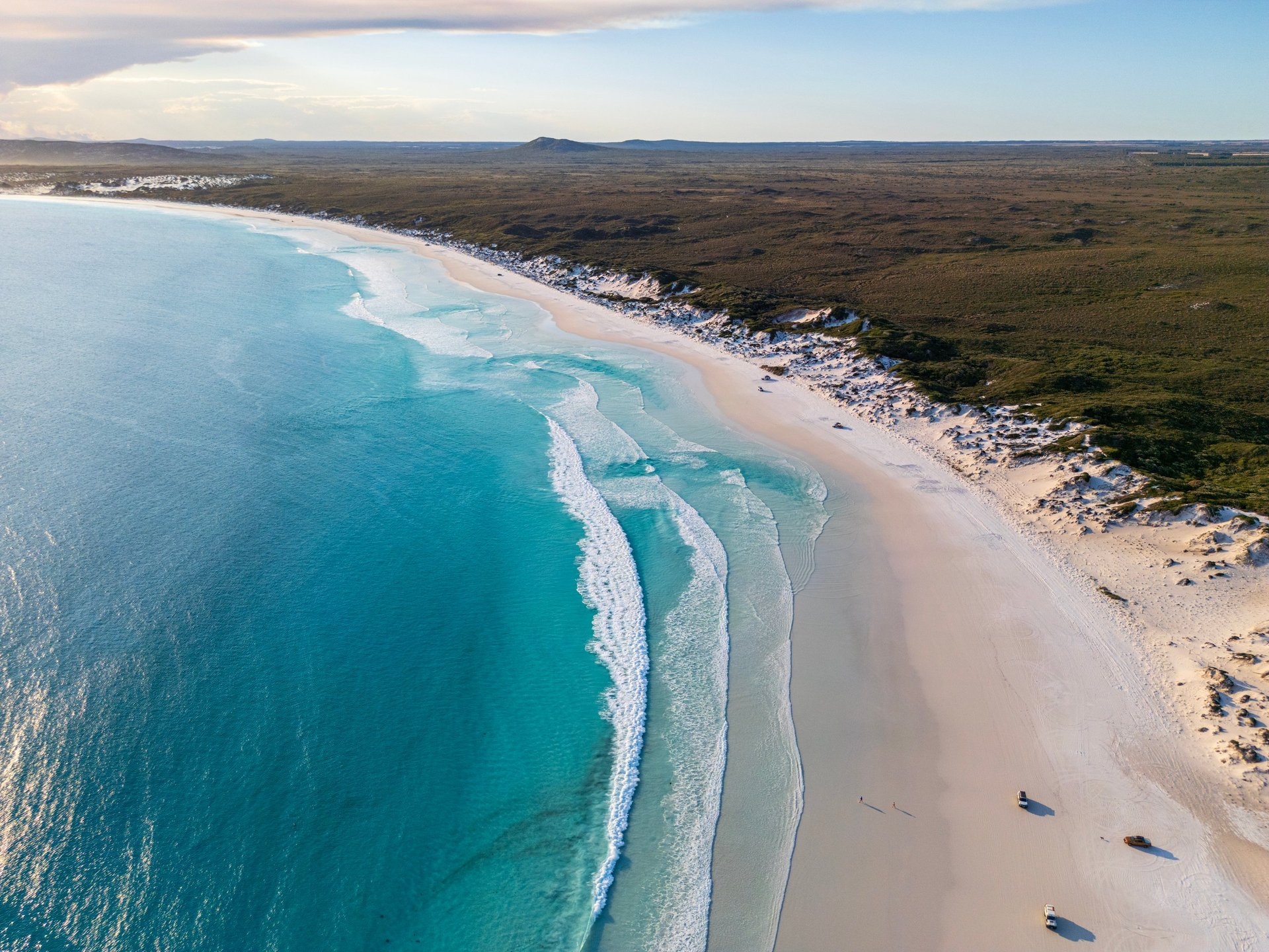 Aerial view of Cancun white sand beach with turquoise Caribbean waters and luxury resorts