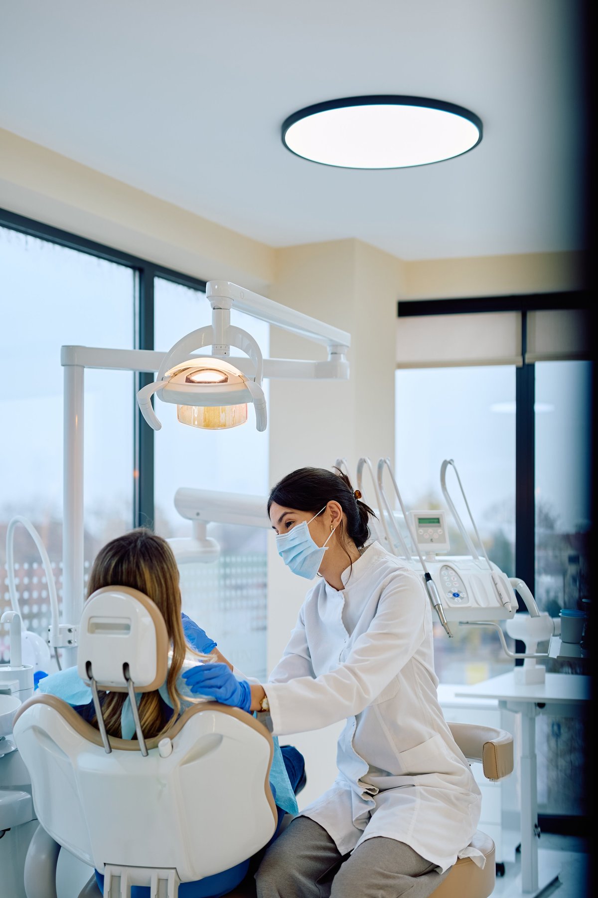Healthcare professional performing dental check-up